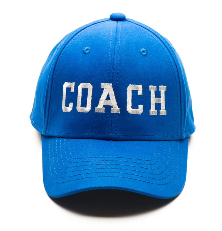 Coach Baseball Cap on White Wyoming Professional Teaching Standards Board